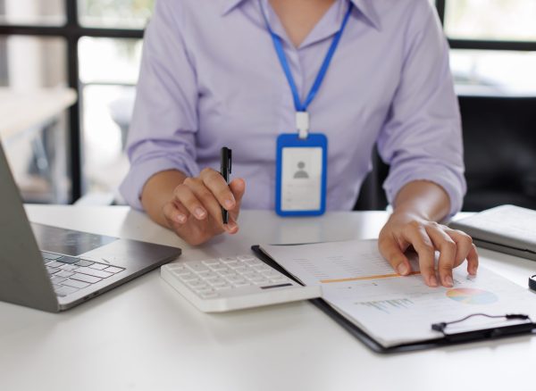 close-up-of-business-woman-or-accountant-hand-hold-2024-09-24-04-27-37-utc